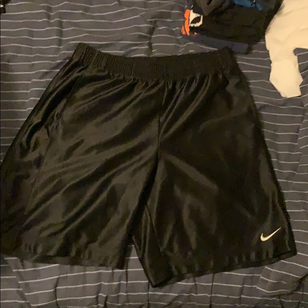 Black nike basketball shorts.